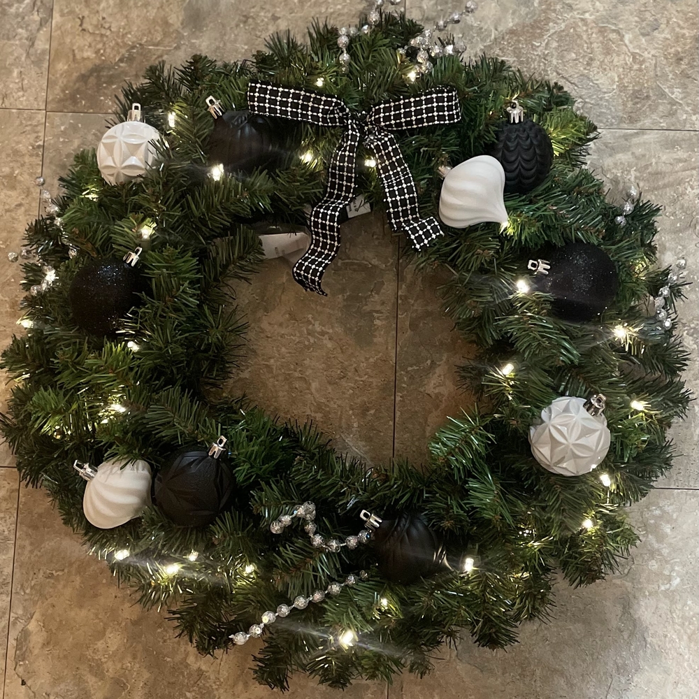 Elegant Holiday Wreath with Black and White Ornaments